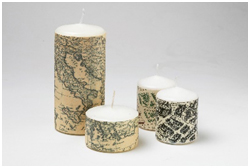 Candele con carte geografiche